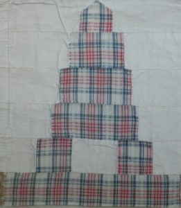 An example of a woven check which is hard to date